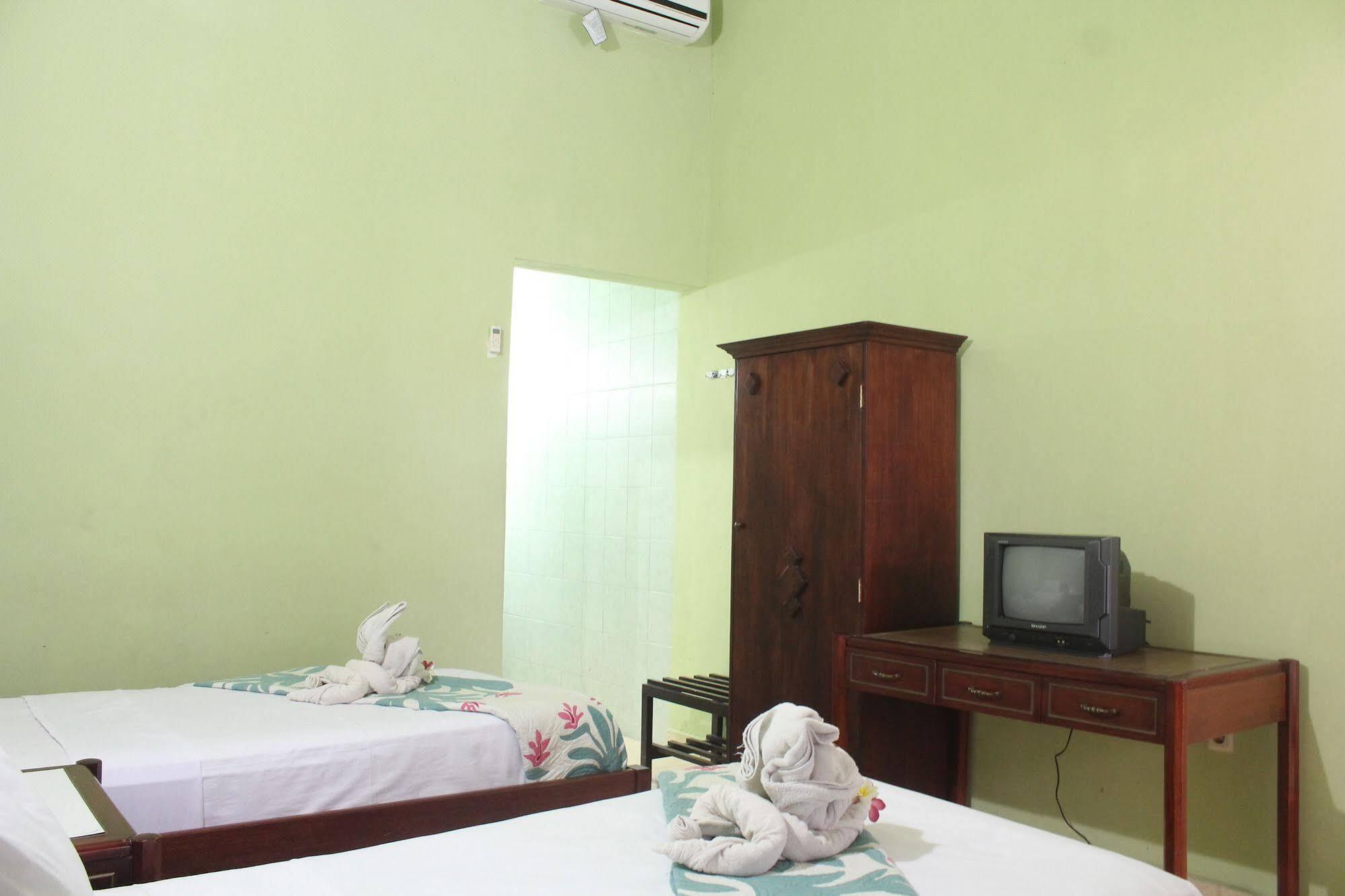 Berlian Inn Kuta Beach Экстерьер фото
